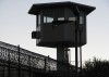 800px-Prison_guard_tower__2967623823_
