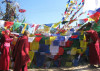 Tibetan nuns hanging prayer flags in Dharamsala, India, seat of the Tibetan Government in Exile, and home of His Holiness the Dalai Lama and a thriving refugee community.