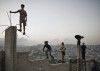 boys playing on a hill overlooking Bethlehem