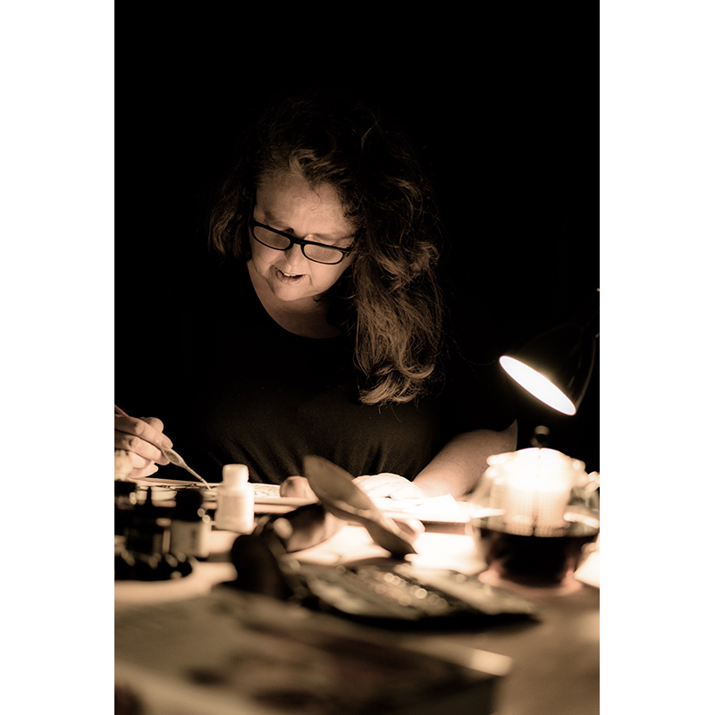 Portrait of Munns in her studio. Photo by Margie Bending.