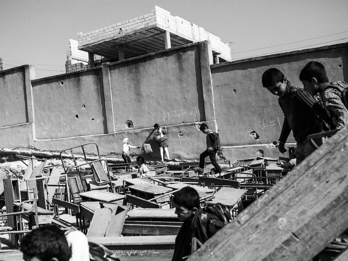 The site of one of three schools in Kobanî. Though it was used as military headquarters during the conflict with ISIS, the site has been reclaimed for teaching. April 19, 2015. Kobanî, Syria.