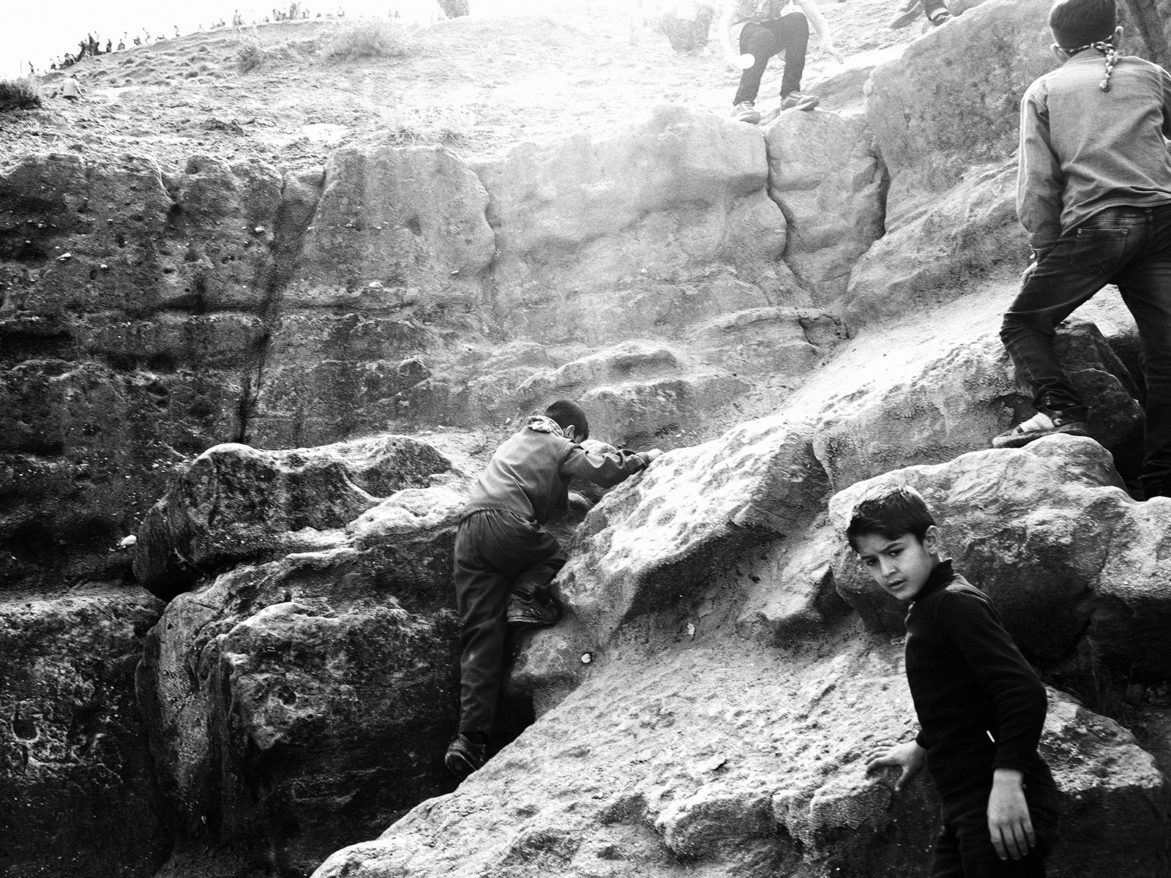 Children climbing Mount Judi during Newroz in Cirze. March 18, 2015. Cizre, Şırnak, Turkey.