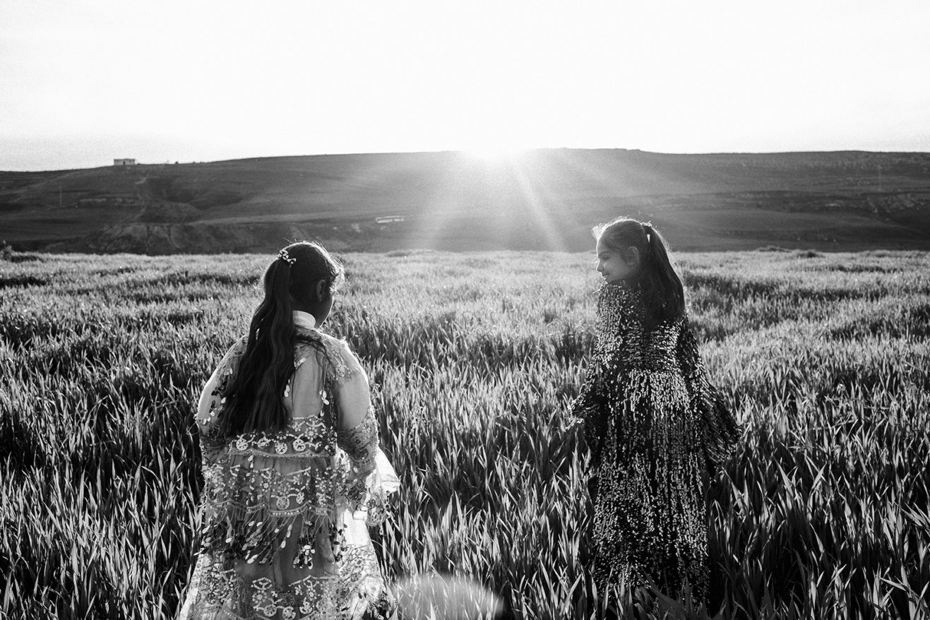 Two girls wearing traditional clothing during the Newroz celebration. March 18, 2015. Cizre, Şırnak, Turkey.