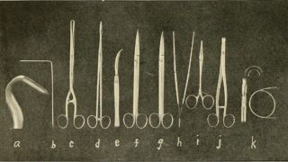 A black and white photo shows various metal surgical instruments neatly laid out and labeled alphabetically.